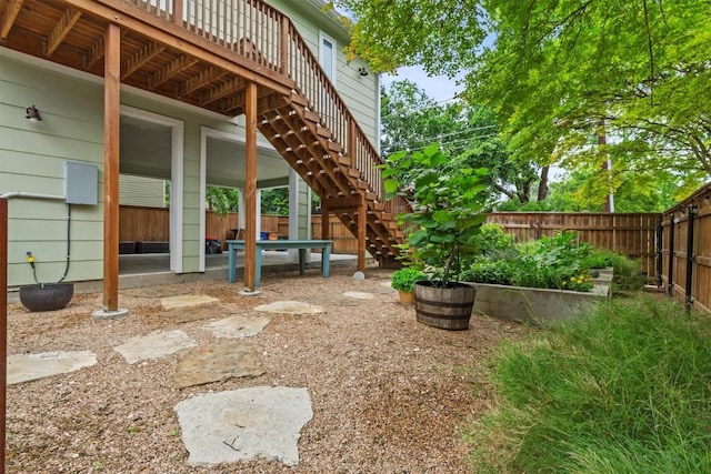 5414 Duval St, Austin, TX 78751 - fenced backyard featuring stairway and a patio