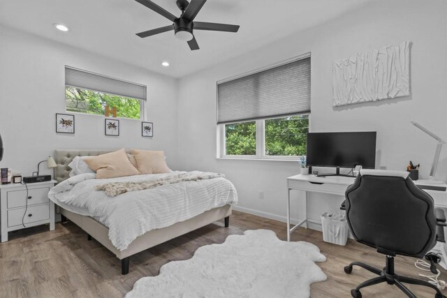 bedroom with recessed lighting, baseboards, ceiling fan, and wood finished floors