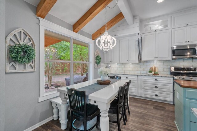 dining area with dark wood finished floors, baseboards, a chandelier, vaulted ceiling with beams, and recessed lighting