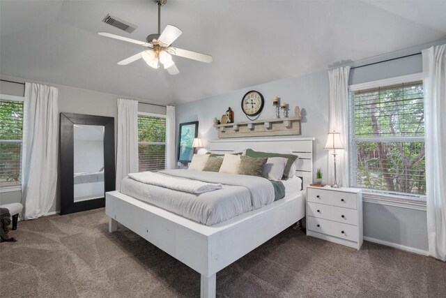 bedroom with carpet floors, visible vents, a ceiling fan, and lofted ceiling