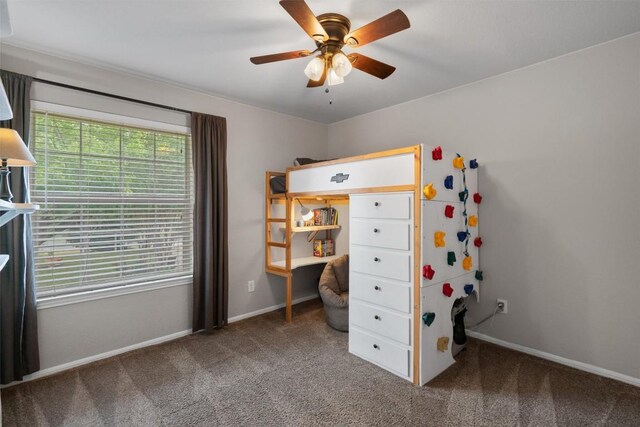bedroom featuring a ceiling fan, baseboards, and carpet