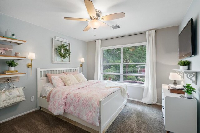 bedroom featuring carpet floors, baseboards, and visible vents