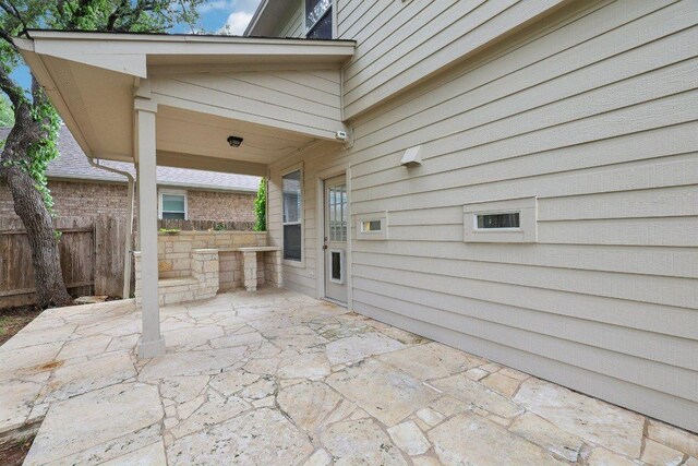 view of patio / terrace with fence