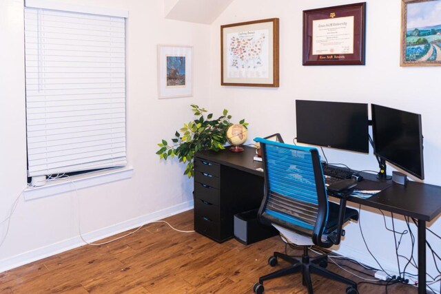 office with baseboards and wood finished floors