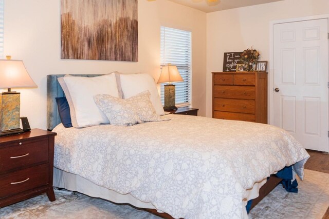 bedroom with wood finished floors