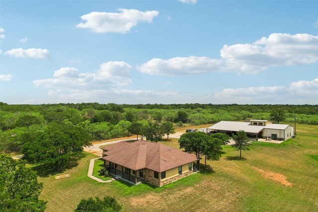 bird's eye view featuring a forest view