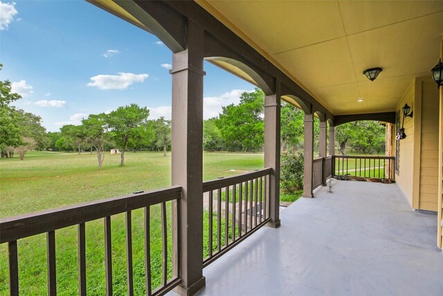 exterior space featuring a yard and a porch