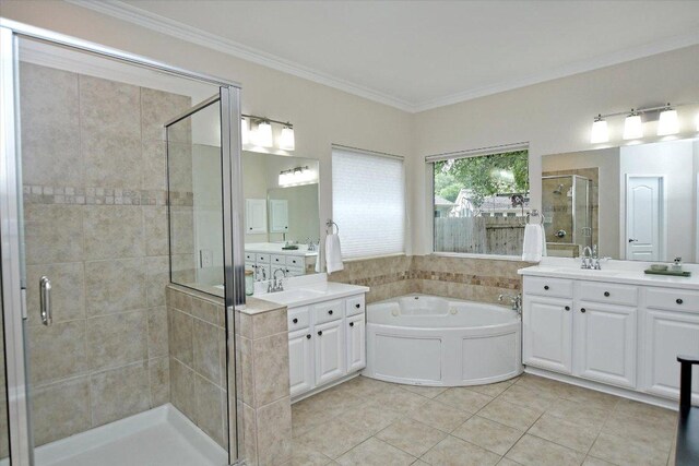 full bathroom featuring crown molding, a sink, tile patterned floors, a garden tub, and a stall shower