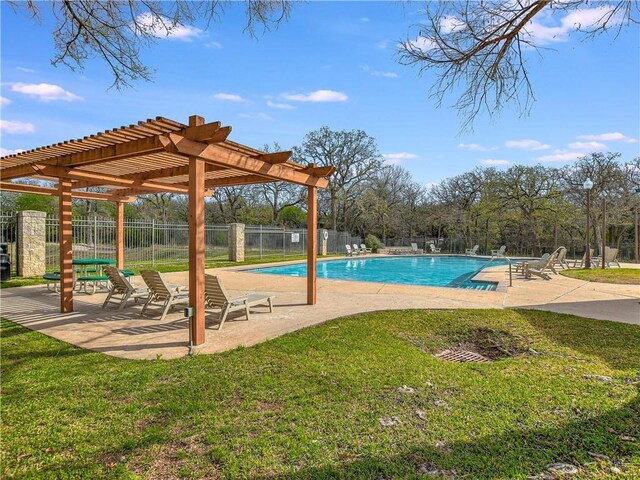 community pool with a yard, a pergola, and fence