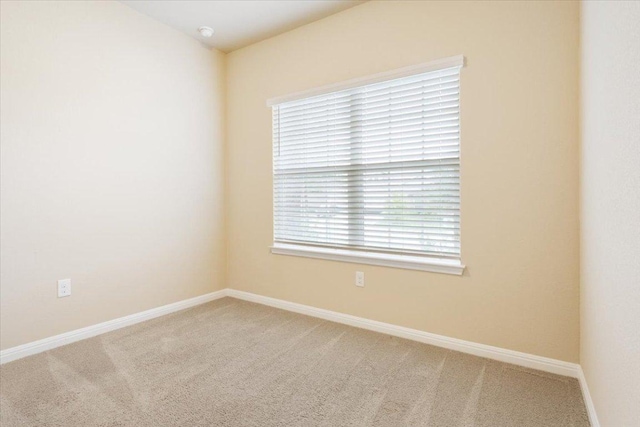1504 Maier Dr, Pflugerville, TX 78660 - spare room featuring carpet flooring and baseboards