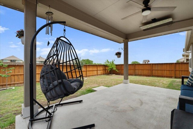 view of patio featuring a ceiling fan and a fenced backyard