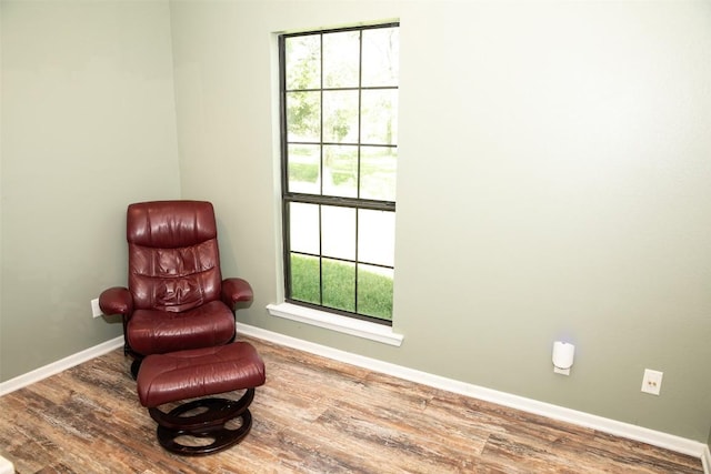 3477 Bradley Ln, Brenham, TX 77833 - living area featuring baseboards, wood finished floors, and a wealth of natural light