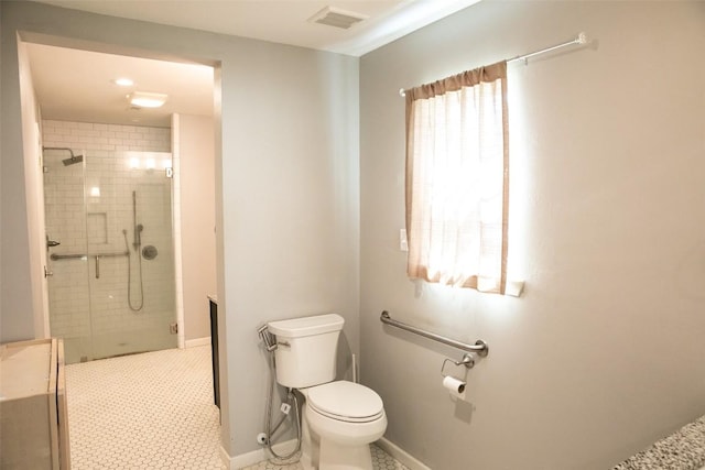 3477 Bradley Ln, Brenham, TX 77833 - bathroom with toilet, visible vents, and a shower stall