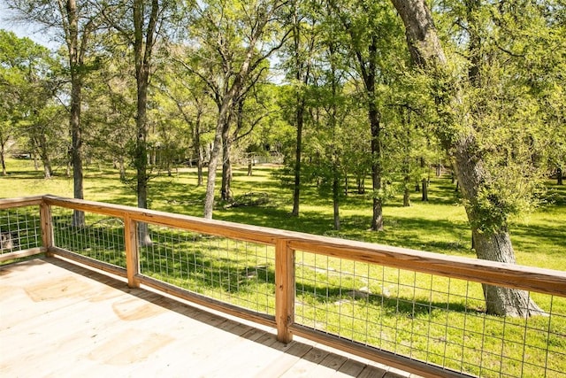 3477 Bradley Ln, Brenham, TX 77833 - wooden deck featuring a lawn