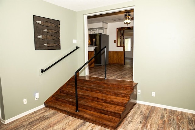3477 Bradley Ln, Brenham, TX 77833 - staircase featuring baseboards, ceiling fan, and wood finished floors
