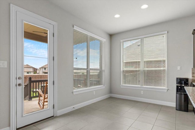 1800 Erie Dr, Leander, TX 78641 - unfurnished dining area featuring recessed lighting and light tile patterned floors