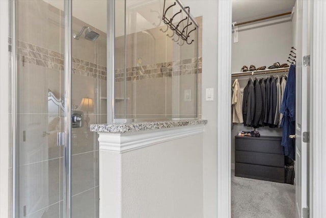 1800 Erie Dr, Leander, TX 78641 - bathroom with a shower stall and a spacious closet