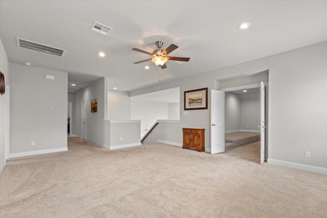 1800 Erie Dr, Leander, TX 78641 - unfurnished living room featuring light carpet, ceiling fan, and recessed lighting