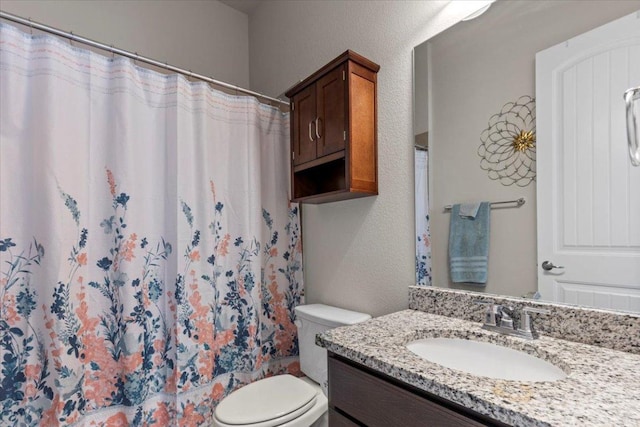 1800 Erie Dr, Leander, TX 78641 - bathroom with vanity, a shower with curtain, and a textured wall