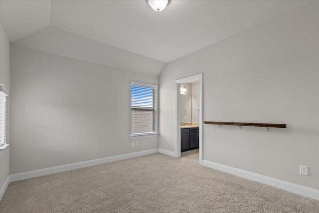 1800 Erie Dr, Leander, TX 78641 - unfurnished room with lofted ceiling and light colored carpet