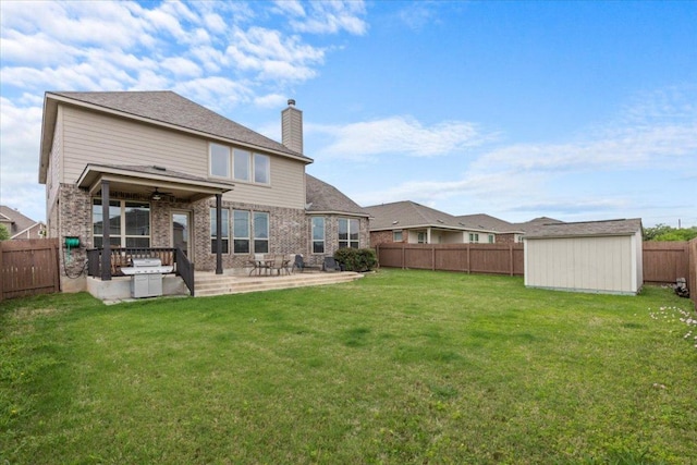1800 Erie Dr, Leander, TX 78641 - back of property featuring a fenced backyard, a patio area, a shed, a chimney, and brick siding