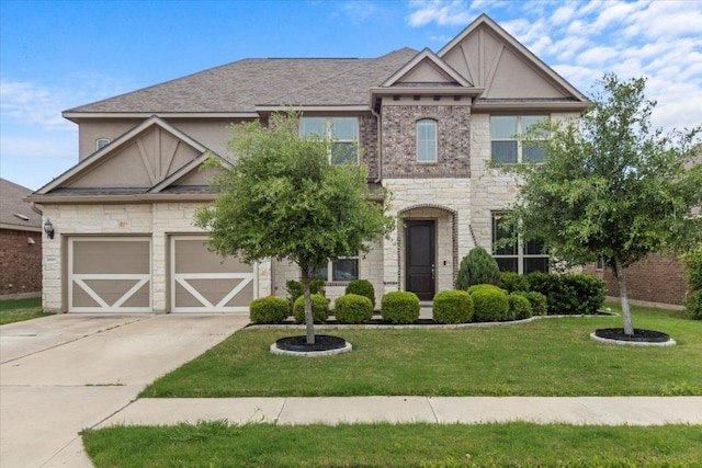 1800 Erie Dr, Leander, TX 78641 - view of front of property featuring stone siding, concrete driveway, a front lawn, an attached garage, and stucco siding
