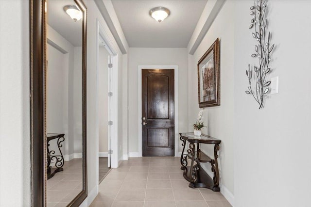 1800 Erie Dr, Leander, TX 78641 - entryway featuring baseboards and light tile patterned floors