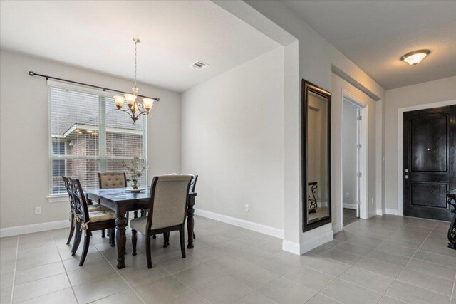 1800 Erie Dr, Leander, TX 78641 - dining room with a chandelier and light tile patterned floors