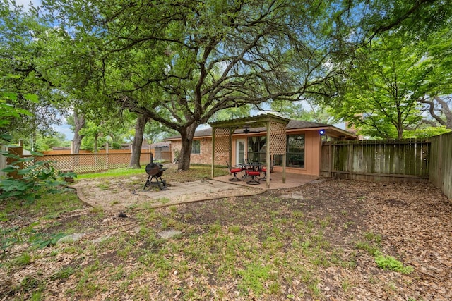 3909 Alderwood Ln, Temple, TX 76502 - fenced backyard featuring a patio area