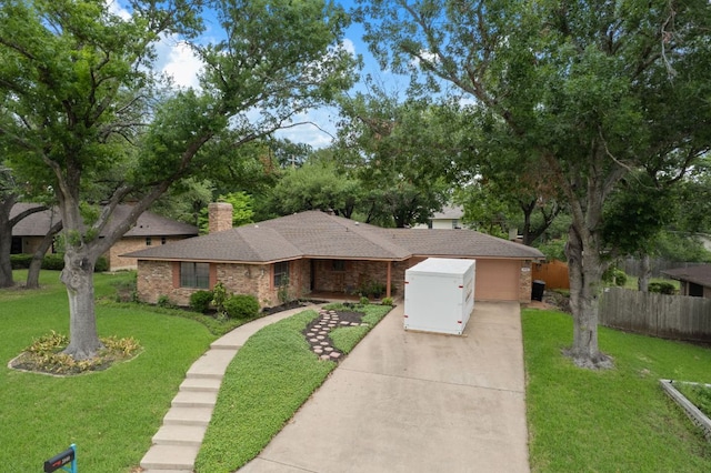 3909 Alderwood Ln, Temple, TX 76502 - ranch-style home featuring driveway, a chimney, brick siding, roof with shingles, and a garage