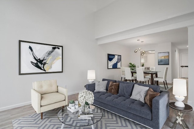 3608 Branigan Ln, Austin, TX 78759 - living room with baseboards and wood finished floors
