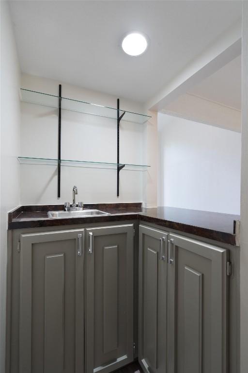 3608 Branigan Ln, Austin, TX 78759 - bar with indoor wet bar and a sink