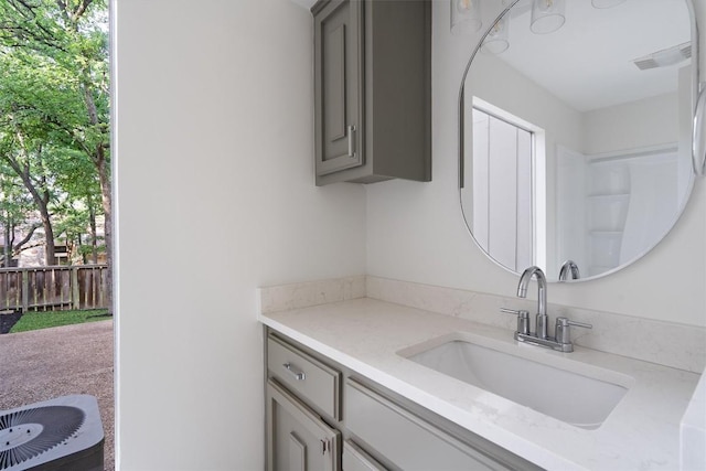 3608 Branigan Ln, Austin, TX 78759 - bathroom with vanity and visible vents