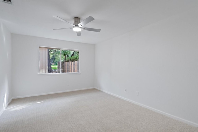 3608 Branigan Ln, Austin, TX 78759 - carpeted empty room featuring baseboards, a ceiling fan, and visible vents