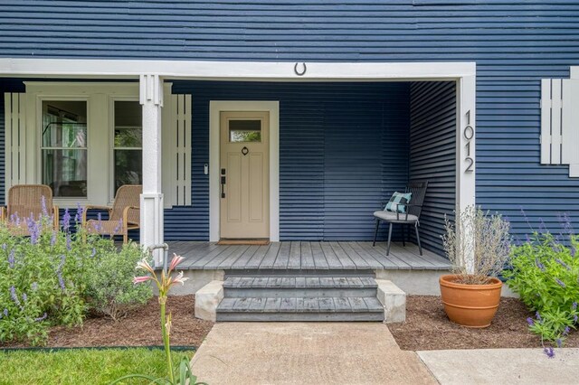 entrance to property with covered porch