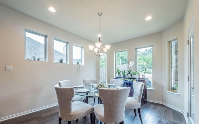 dining area with recessed lighting, baseboards, a notable chandelier, and dark wood-style floors