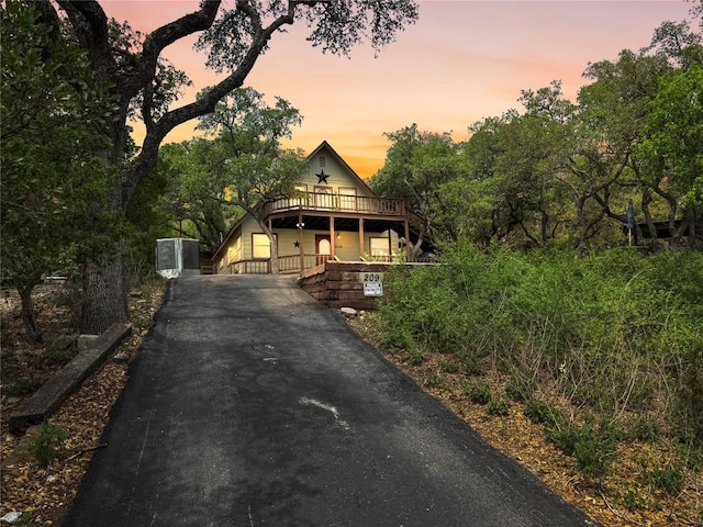 209 Lake Frst, Canyon Lake, TX 78133 - view of front of property with a porch and aphalt driveway