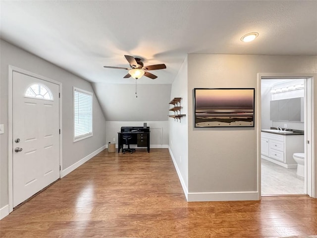 209 Lake Frst, Canyon Lake, TX 78133 - foyer with baseboards, ceiling fan, light wood finished floors, and lofted ceiling