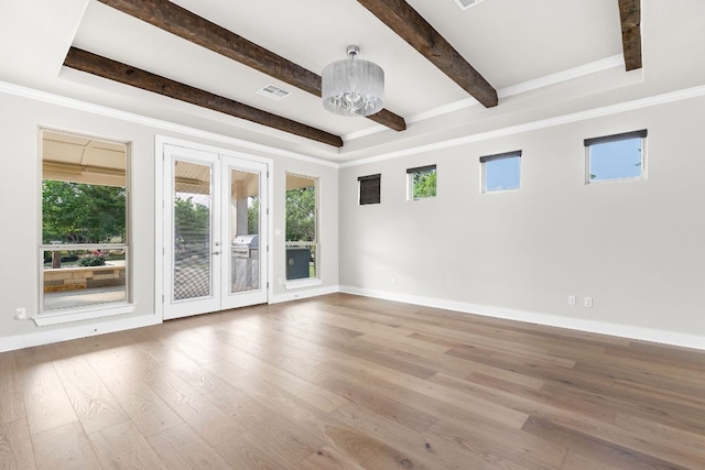 2120 High Lonesome Dr, Leander, TX 78641 - spare room featuring beam ceiling, wood finished floors, and crown molding