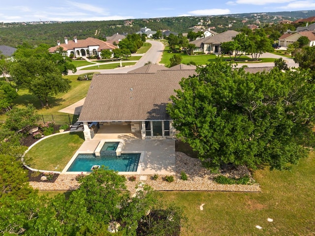 2120 High Lonesome Dr, Leander, TX 78641 - aerial perspective of suburban area with a pool