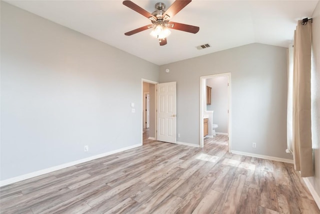 234 Saint Marys Dr, Hutto, TX 78634 - unfurnished bedroom with a ceiling fan, visible vents, light wood-type flooring, baseboards, and connected bathroom