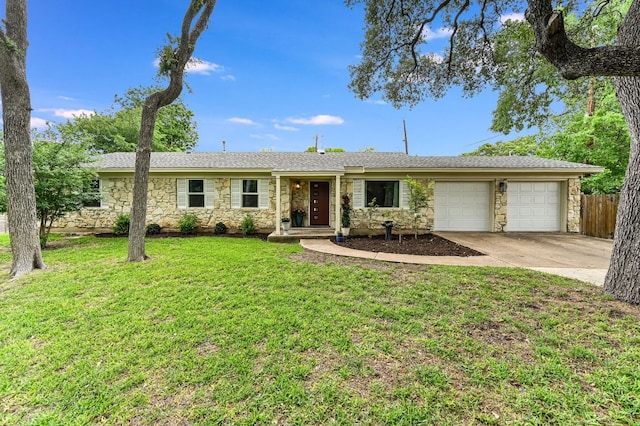 11600 Eubank Dr, Austin, TX 78758 - ranch-style house with stone siding, an attached garage, and concrete driveway