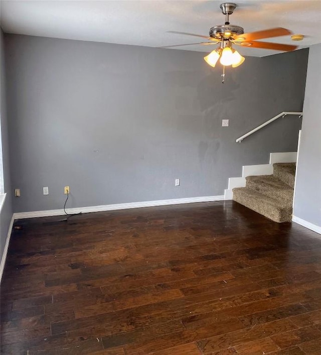 619 Ellen Ct, Temple, TX 76501 - empty room with baseboards, wood finished floors, ceiling fan, and stairs