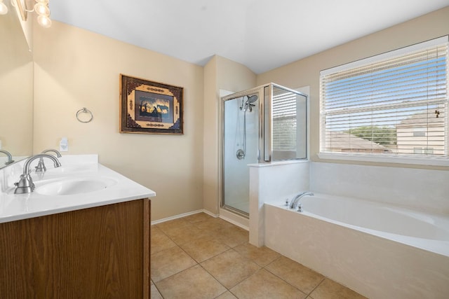 12616 Wayne Spur Ln, Elgin, TX 78621 - full bathroom with a bath, a stall shower, tile patterned flooring, and double vanity