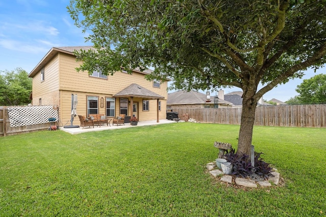 12616 Wayne Spur Ln, Elgin, TX 78621 - rear view of house featuring a patio