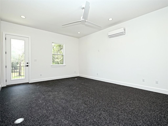 unfurnished room featuring recessed lighting, ceiling fan, a wall unit AC, and baseboards