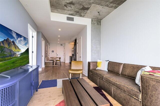 living room with visible vents and light wood finished floors