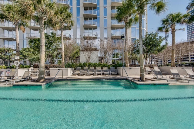 community pool with a patio
