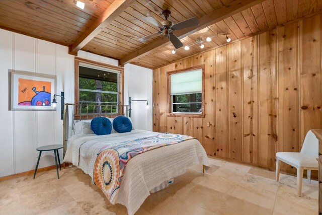 bedroom with track lighting, multiple windows, and wooden ceiling