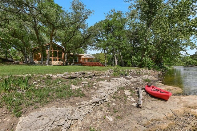 view of yard with a water view